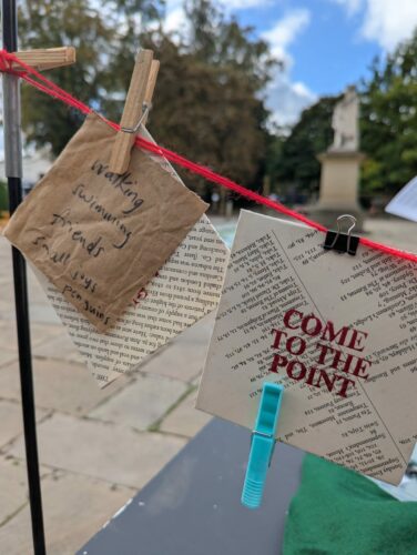 Image of response and envelopes on a line above the cart.
