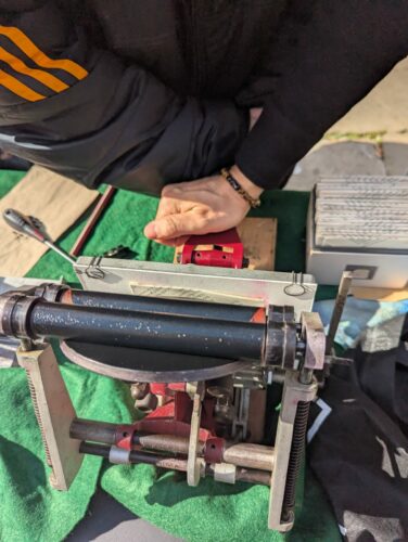 Image of the adana printing press in action.