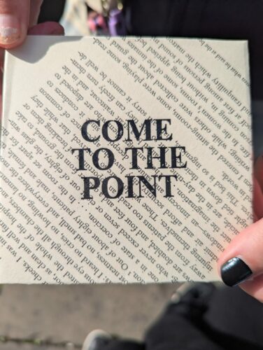 Image of the envelope with words 'come to the point' printed on it. 