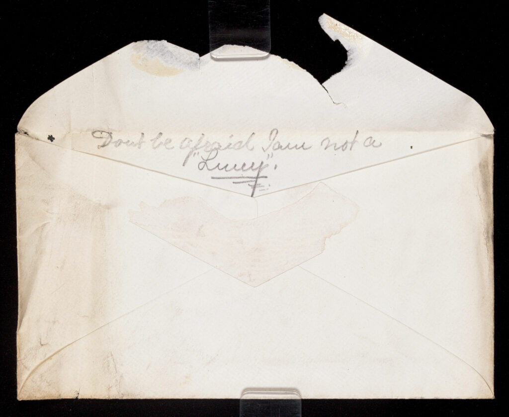 Envelope showing the inside with handwriting that reads 'don't be afraid I am not a Luny'.